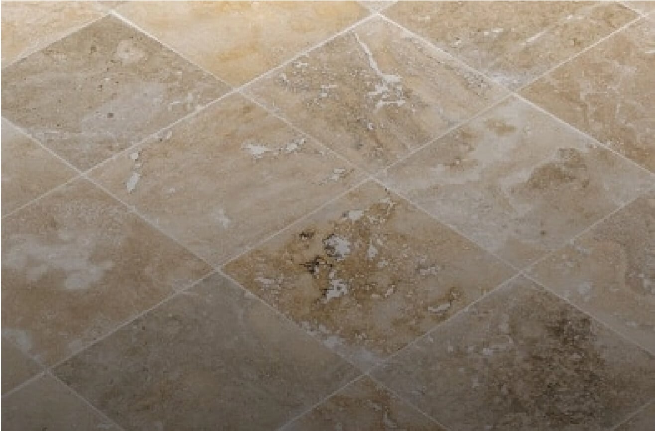 Travertine tile floor after professional cleaning and sealing services in Queen Creek, Arizona